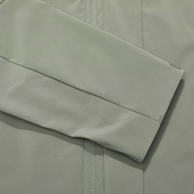 FILA CORE Men's DESIGN MUSEUM DENMARK WHITE LINE BLUE Woven Top in Green (Unisex)