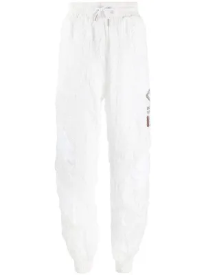 Pantaloni sportivi con logo stropicciato