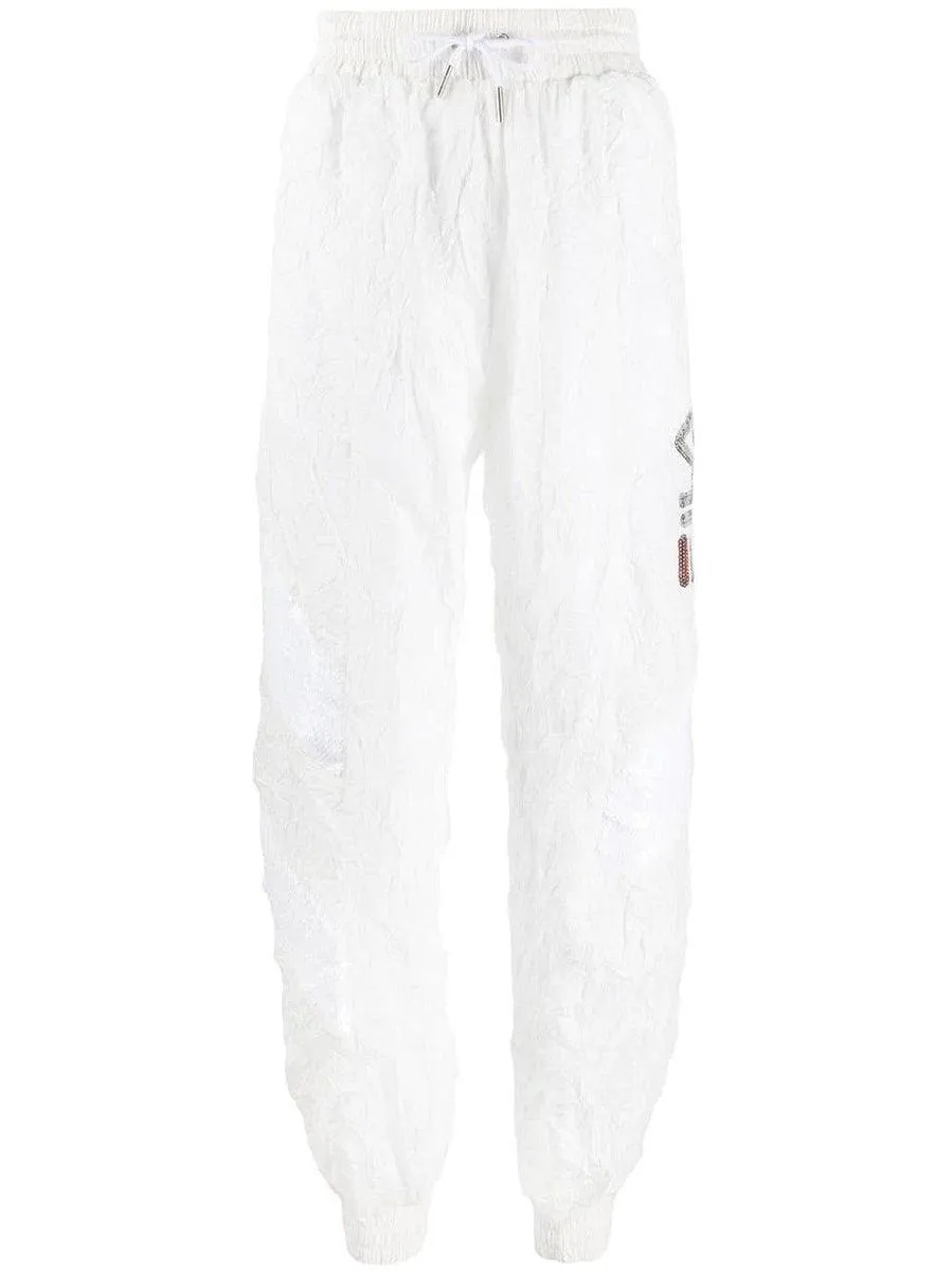 Pantaloni sportivi con logo stropicciato