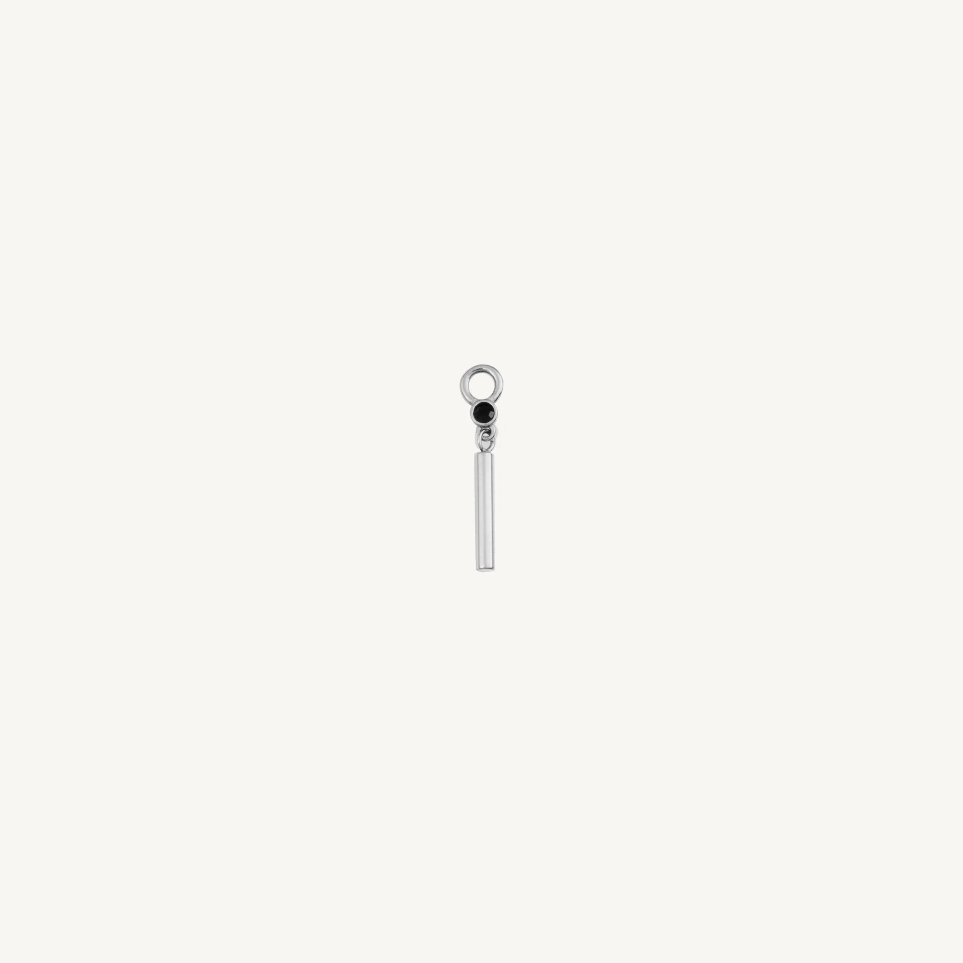 Single Black Gem and Bar Charm