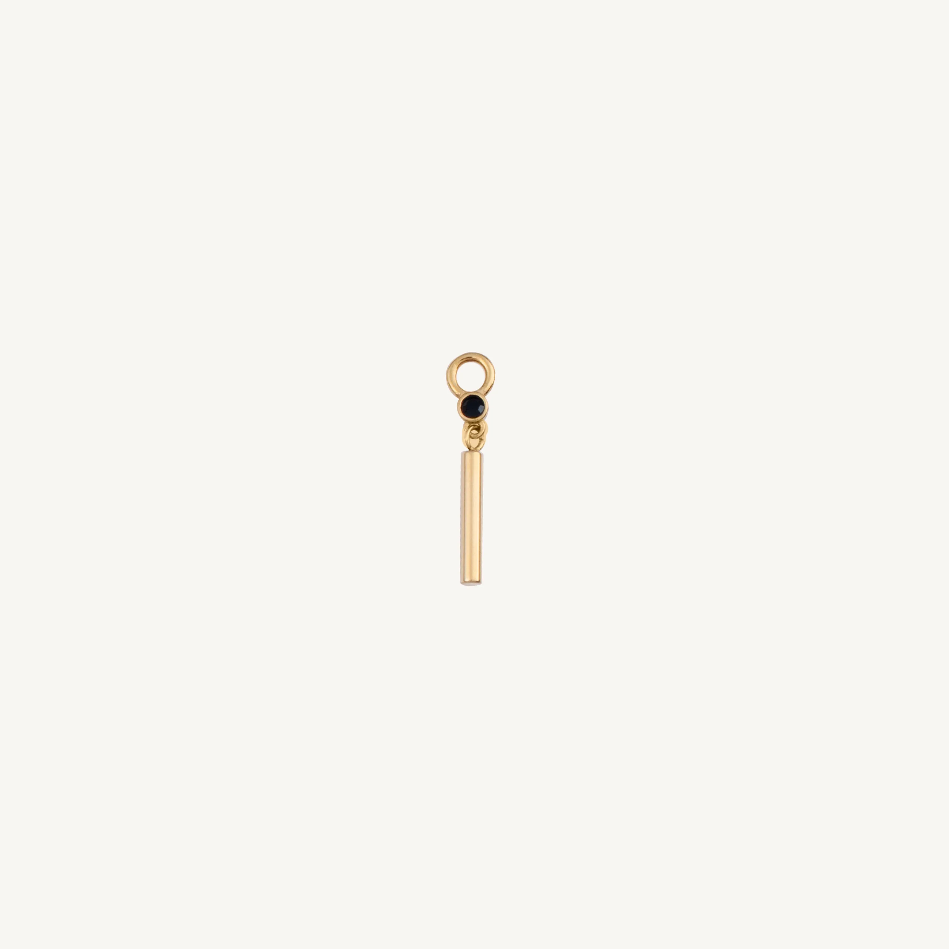 Single Black Gem and Bar Charm